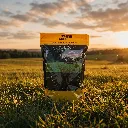 Grass_seed_bag_in_field_2K_20261015163947.webp